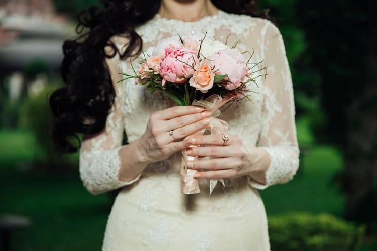 Bride holding bouquet of flowers